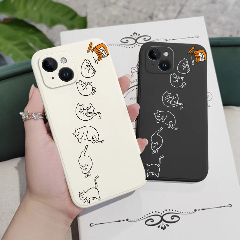 猫イラストのiphoneケースの白と黒を手に持つ