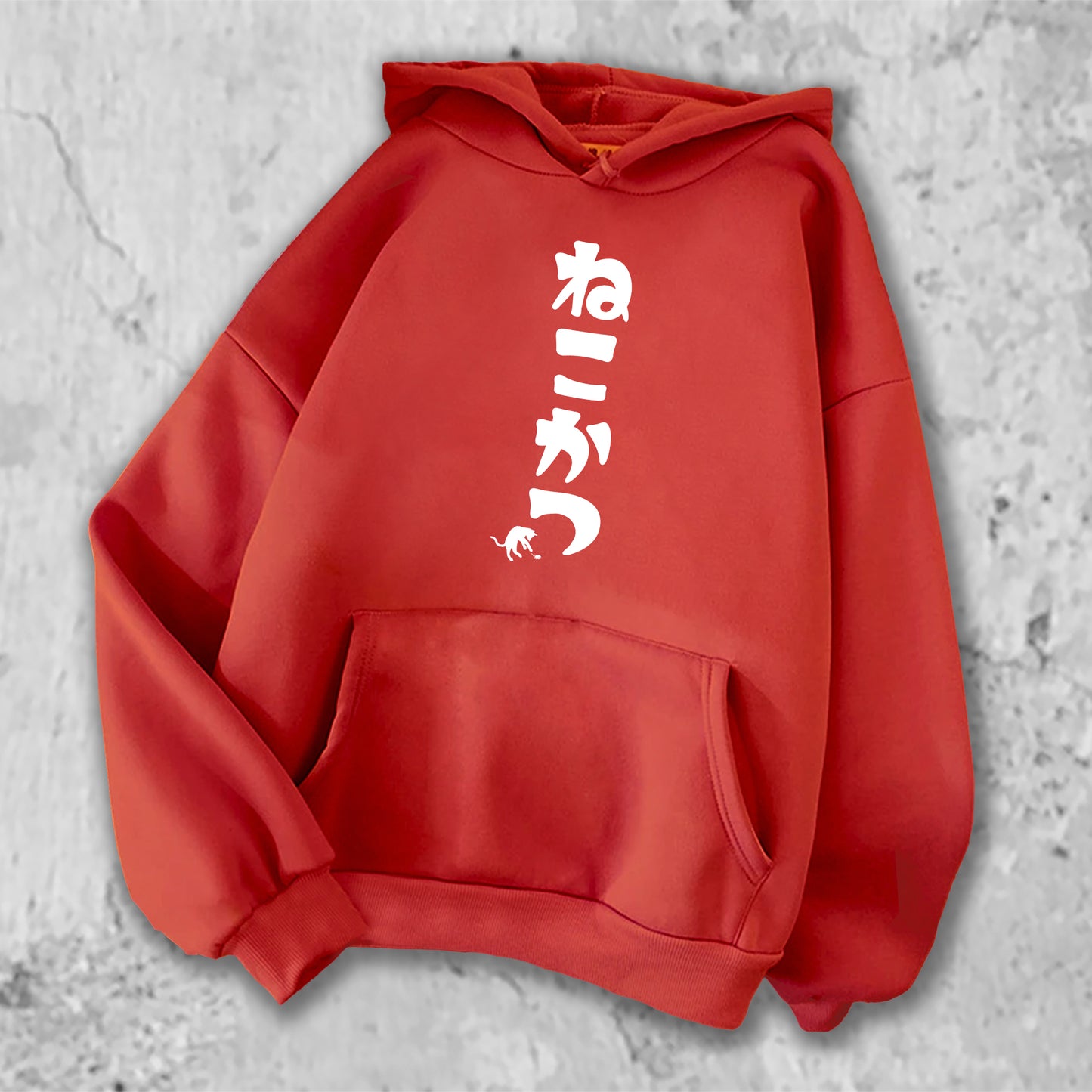 ねこかつとプリントされたTシャツの赤