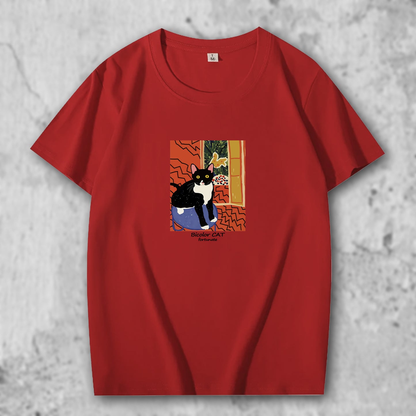 マティスのブチ猫の作品がプリントされたTシャツのレッド