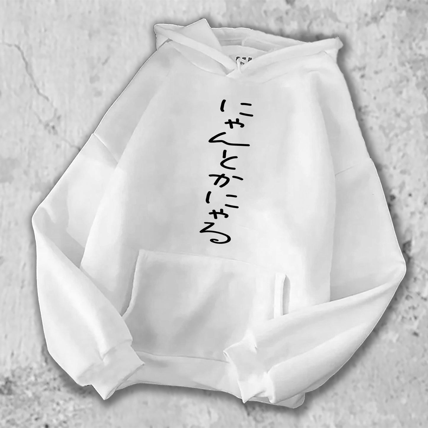 にゃんとかにゃる、とプリントされたTシャツの白