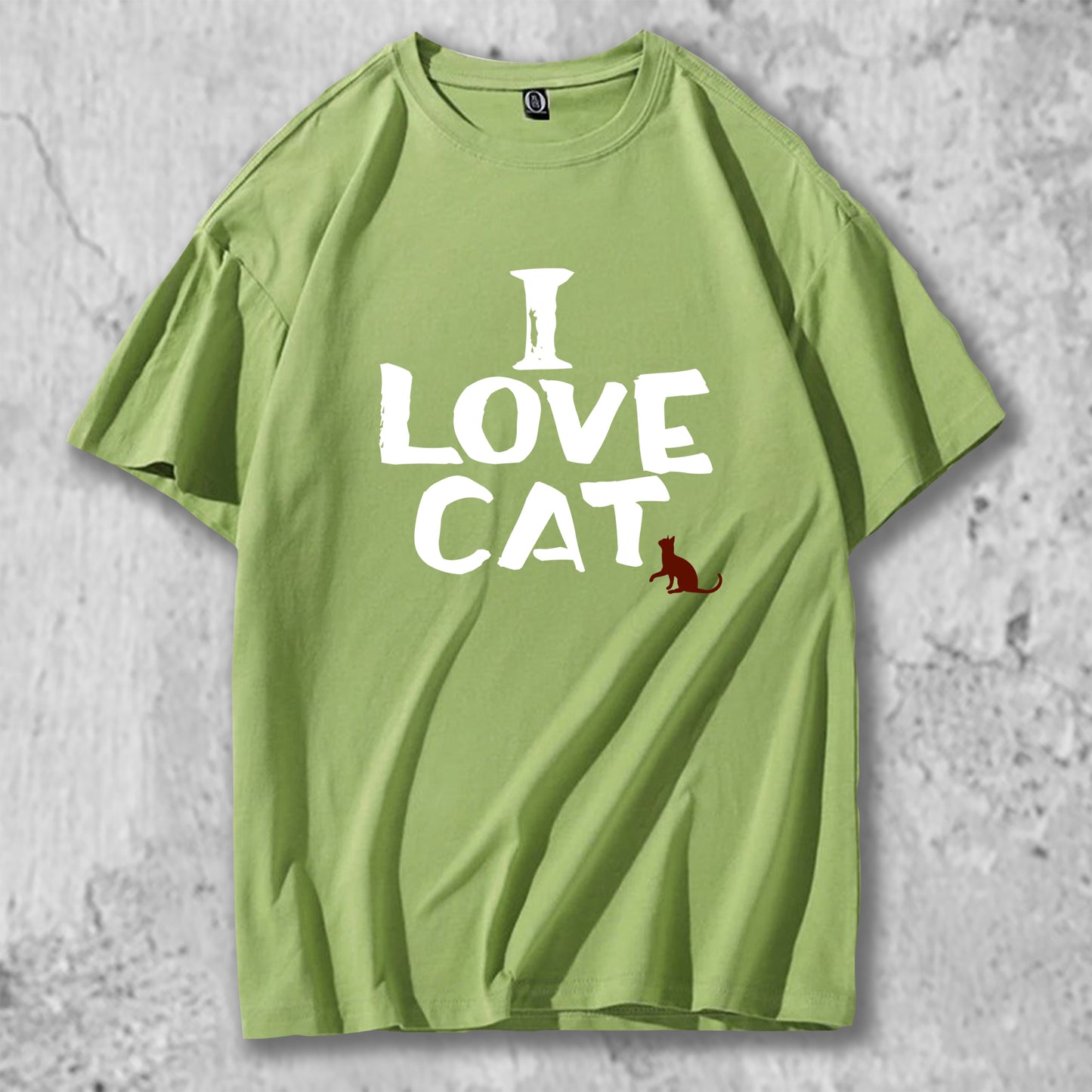I LOVE CATと書かれたTシャツのグリーン