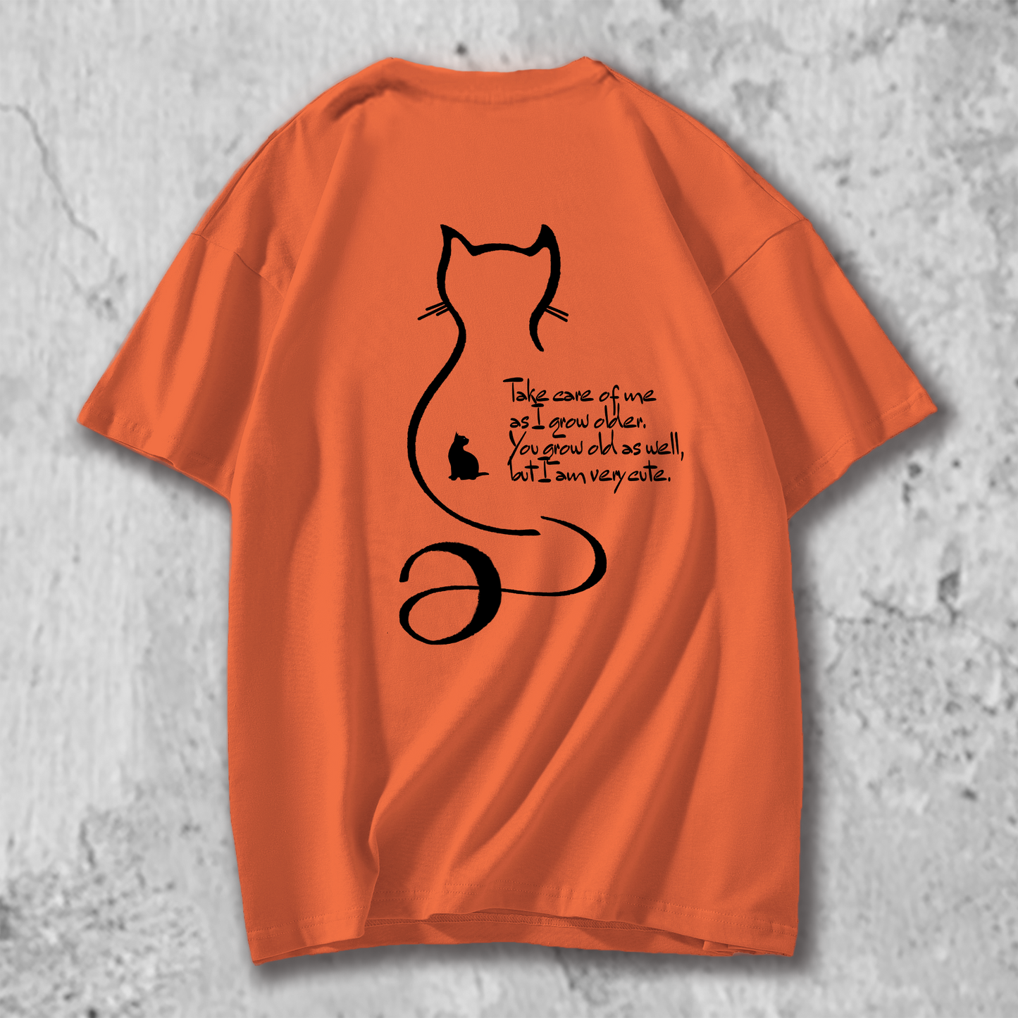 猫の十戒のイラストのTシャツのオレンジ