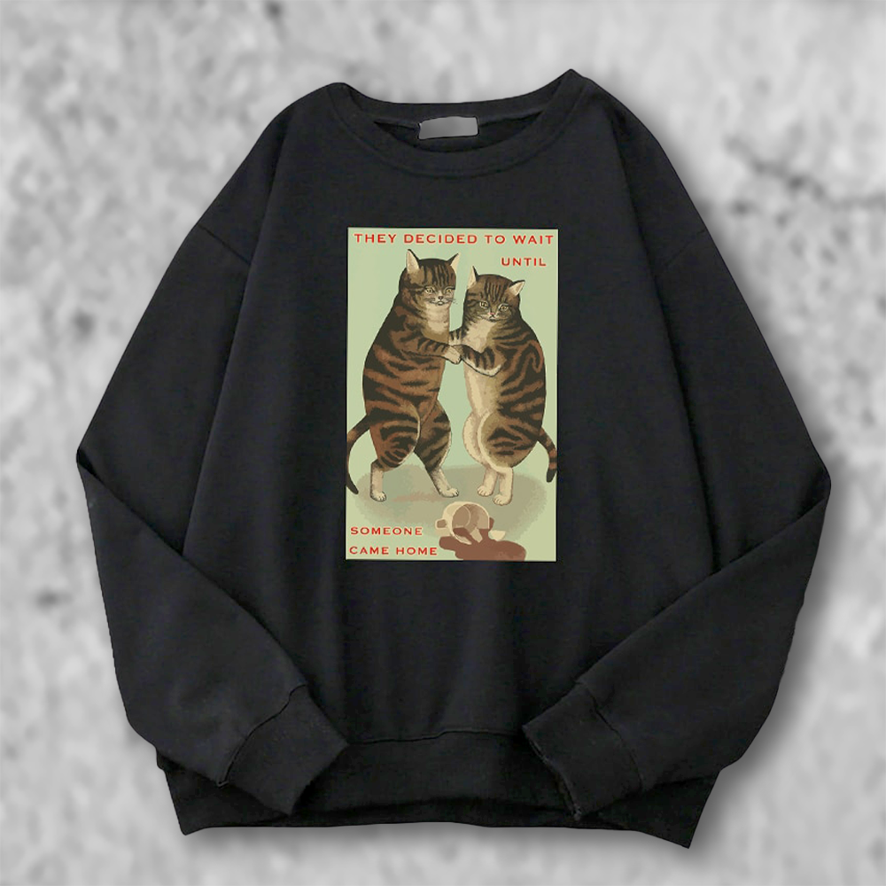 こぼした猫のパーカーの黒