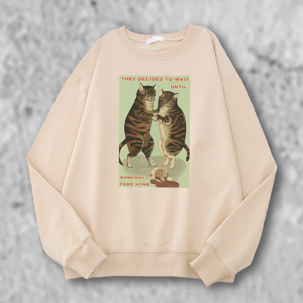 こぼした猫のパーカーのべージュ