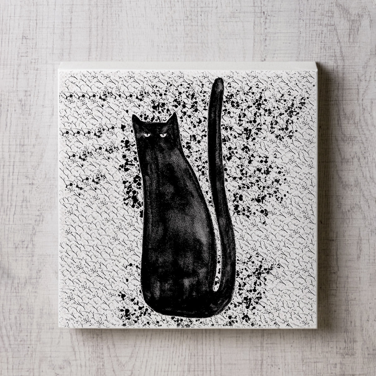 黒猫のイラストのキャンパスパネルの正面