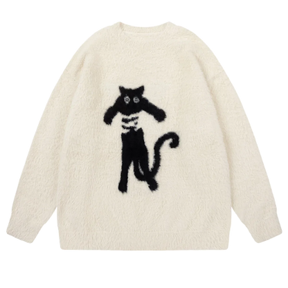 黒猫のイラストのセーターの白