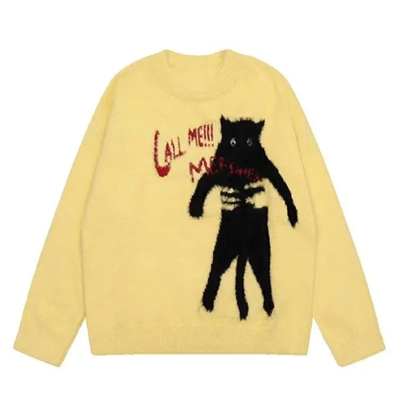 黒猫のイラストのセーターのイエロー