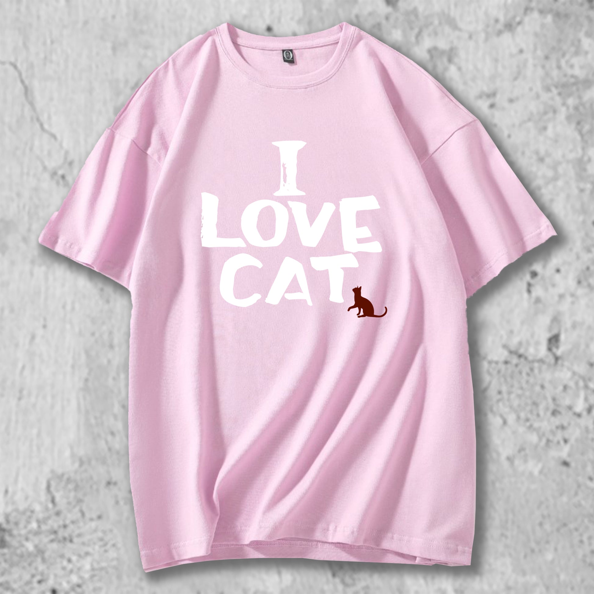 I LOVE CATと書かれたＴシャツのピンク